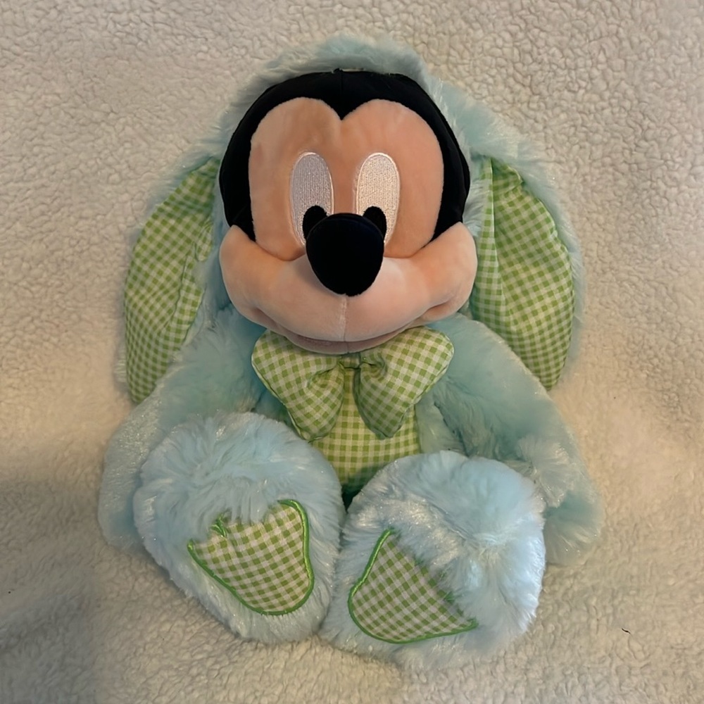 Disney Mickey plush dressed as Easter bunny.